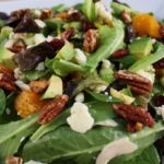 Field greens chicken salad is a delicious and healthy salad, topped with tender chicken breast, blue cheese, and candied pecans.