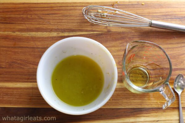 mixing the vinaigrette dressing.