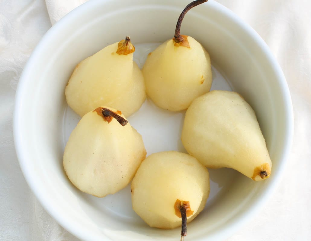 Poached pears in a Dutch oven.