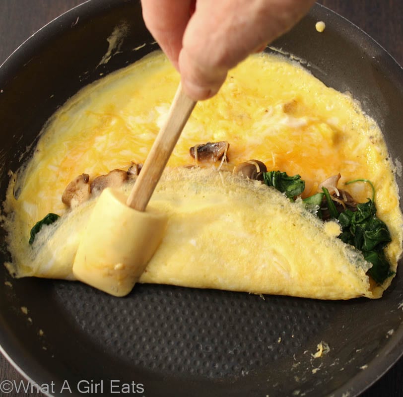 Folding an omelette.