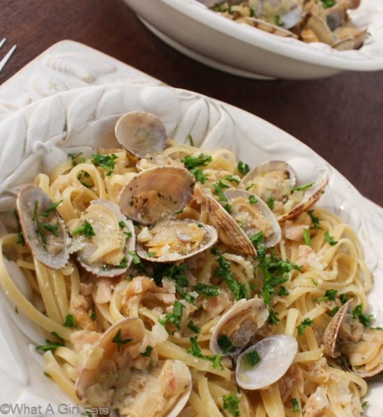 Pasta al Vongole, also known as linguine with clam sauce, is an Italian pasta dish, made with tender sauteed clams and a flavorful white wine sauce. It is quick and easy to prepare, making it perfect for a weeknight dinner. | from @whatagirleats