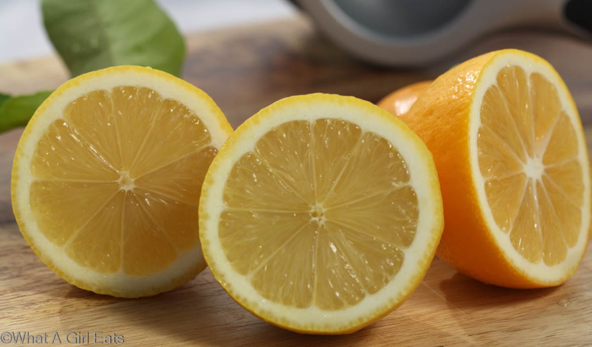 Eureka and Meyer lemons cut in half.