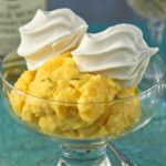 Mango-Pineapple Sherbet with Meringue "Clouds". - Meringue topped mango-pineapple sherbet is a tropical frozen dessert. It is easy to make and deliciously refreshing to eat! | What A Girl Eats