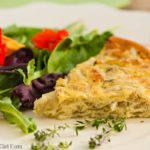 Crustless onion quiche is a quick, easy, wheat free meal. It's delicious, healthy, and versatile enough to be eaten for any meal of the day! | WhatAGirlEats.com