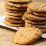 White chocolate macadamia cookies are soft yet crispy cookies, rich and buttery, with toasted coconut throughout. The perfect companion for a cup of coffee or tea!
