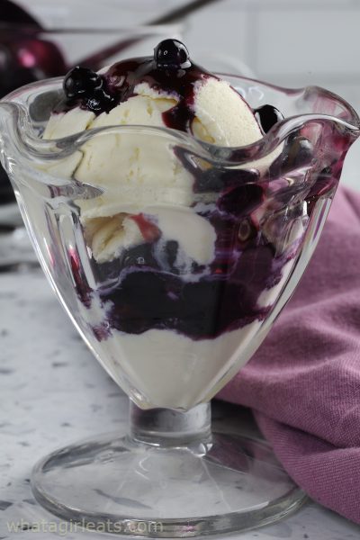 blueberry compote on vanilla ice cream.