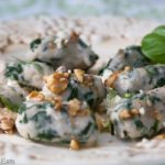 Spinach Ricotta Browned Butter Gnocchi, with basil, toasted walnuts and Gorgonzola cheese. A rich, creamy, and indulgent dinner! | @whatagirleats
