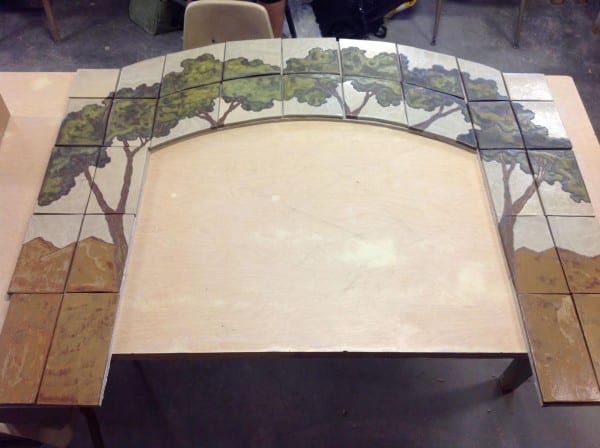 Commissioned fireplace surround, by artist Sarah Moore