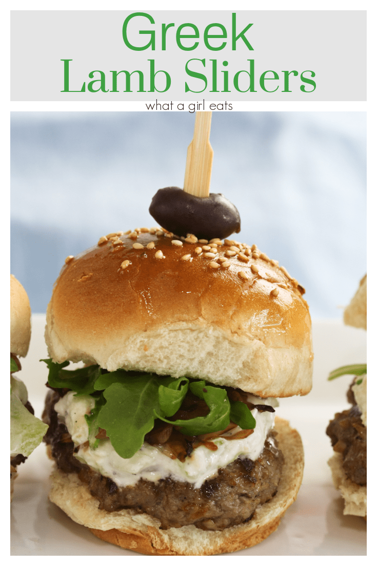 Lamb burgers get a Greek twist with grilled onions, feta and tzatziki and arugula. They're great as sliders for game days or as quarter pounders.