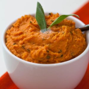 Browned butter mashed sweet potatoes with sage is an easy Thanksgiving side dish recipe, but it's delicious to eat any time of the year. | WhatAGirlEats.com