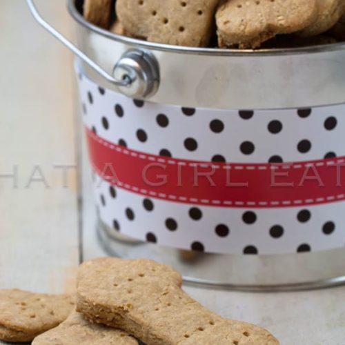 Show your furry friend how loved they are by making them Homemade Dog Treats! Recipe on WhatAGirlEats.com