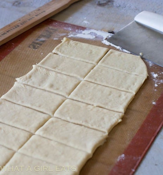 Beignet dough cut into rectangles.