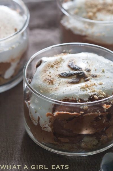 Dark chocolate s'mores trifles are single serving desserts made with creamy Kahlua-spiked chocolate mousse and toasted marshmallow. Delicious, impressive and they're beautiful, too! | @whatagirleats