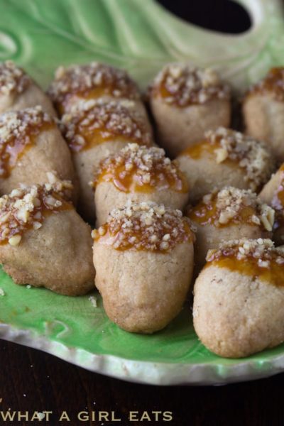 Caramel dipped walnut shortbread acorn cookies.