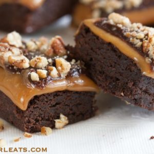 Millionaire Brownies, classic brownies layered with caramel, ganache and chopped nuts. @whatagirleats. com