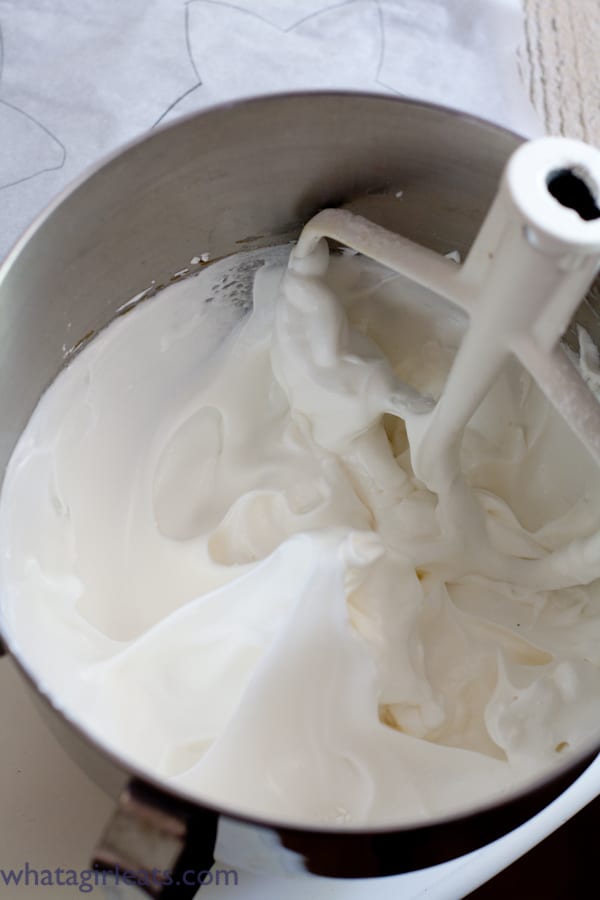 The meringue should be stiff and glossy, so that when the beater is pulled through, peaks are formed.