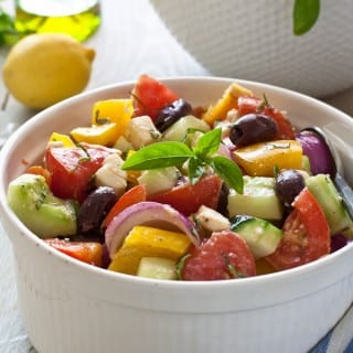 Greek Salad in white bowl.