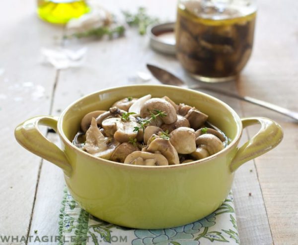 Simple marinated mushrooms are just that - Mushrooms marinated in white wine, vinegar, herbs and garlic. Perfect on a steak! 