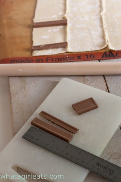 The batons should be about 3 inches in length. Cut a chocolate bar to fit the pastry. @whatagirleats.com