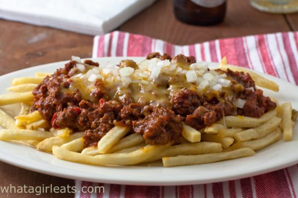  Sloppy Joe Cheese Fries; make the Sloppy Joe meat in the slow-cooker, top with cheese and onions. Game day favorite.