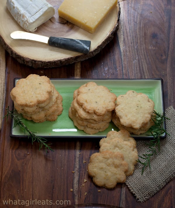 Savory Cheddar and Rosemary Shortbread cookies on a platter.