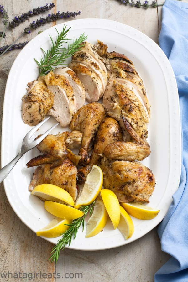 This French Roasted Chicken is rubbed with herbs and butter and stuffed with a lemon, to make the moistest and easiest chicken ever!