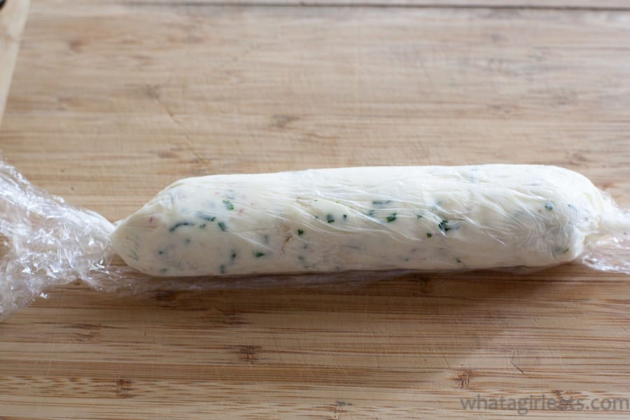 Form the softened herb butter into a log and chill. 