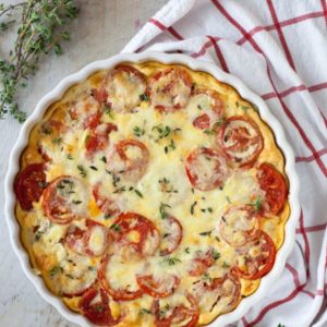 This simple Gluten-Free Tomato Cheese Tart is a breeze to throw together and makes perfect use of garden tomatoes!.