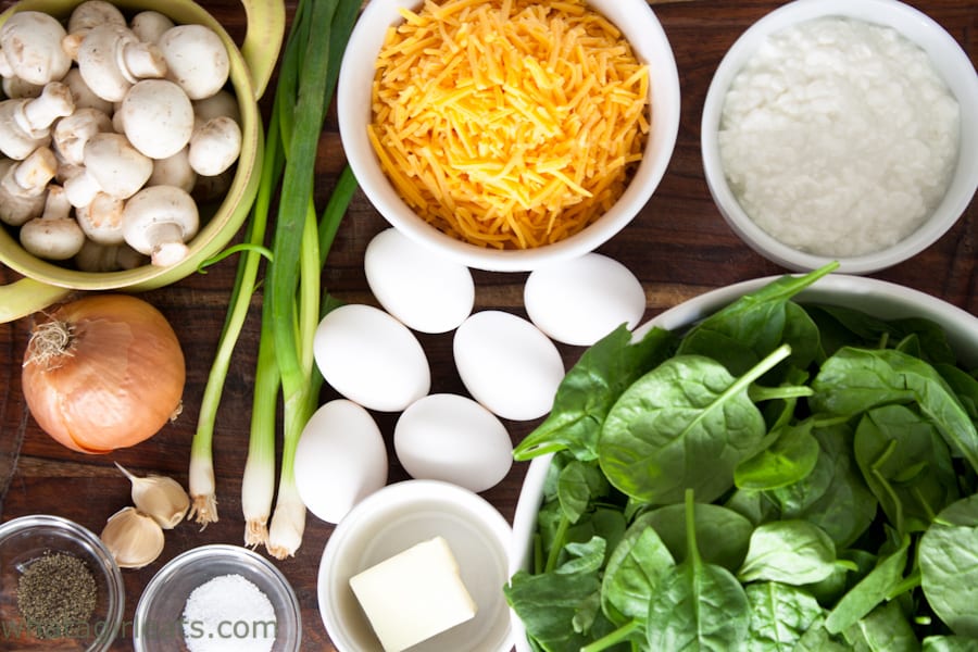 Eggs, cheese, and other ingredients in bowls