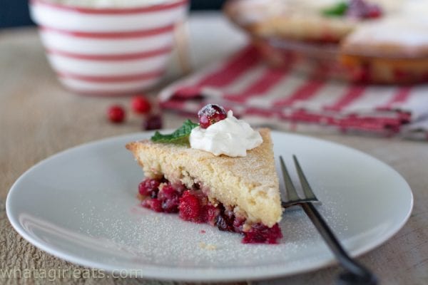 Slice of Nantucket Cranberry Pie on a plate with a fork.