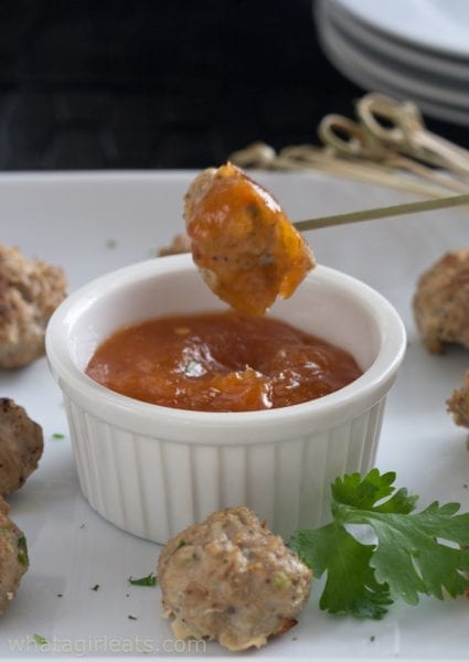 sweet and sour pork balls on skewer.