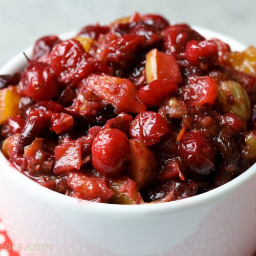 cranberry chutney in white bowl.