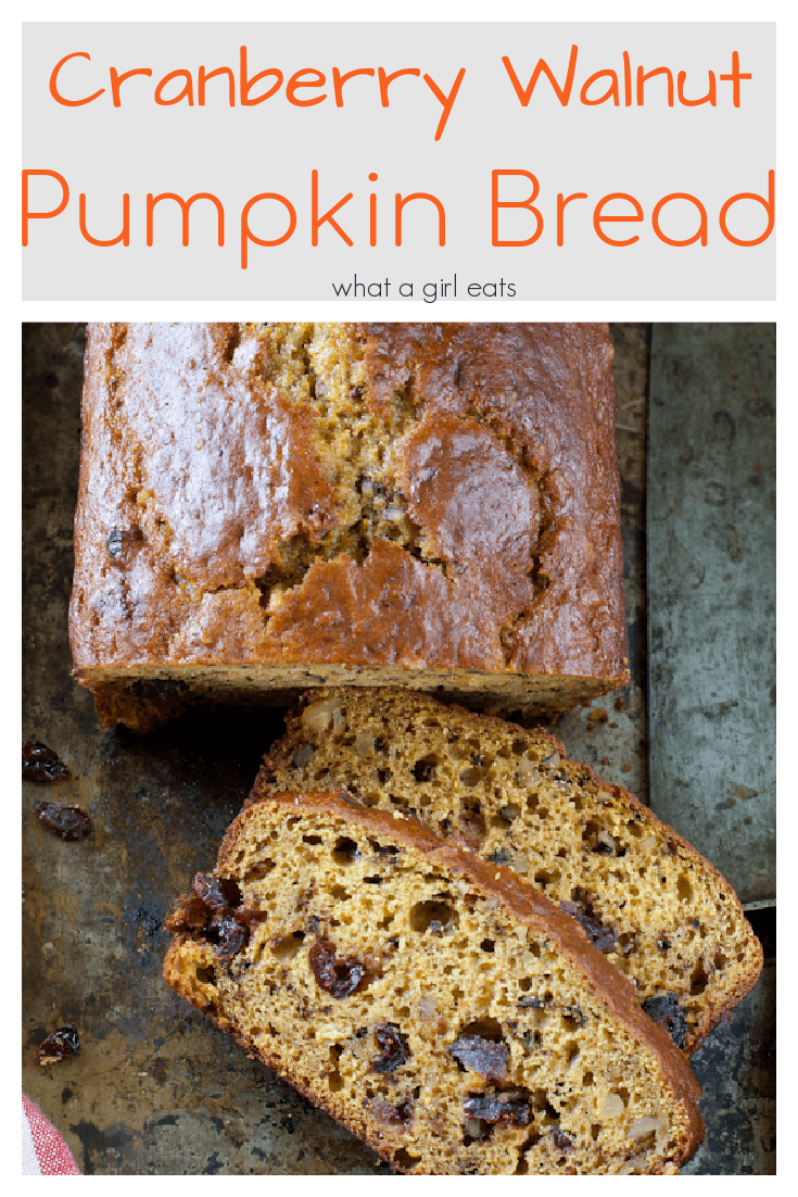 Moist and tender pumpkin bread with cranberries and walnuts.