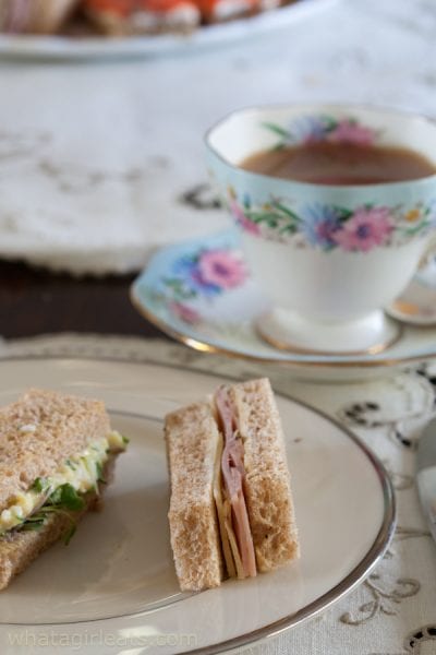 tea sandwiches and pretty mug.