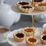 jam tarts on tea stand.