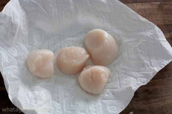 drying the scallops.