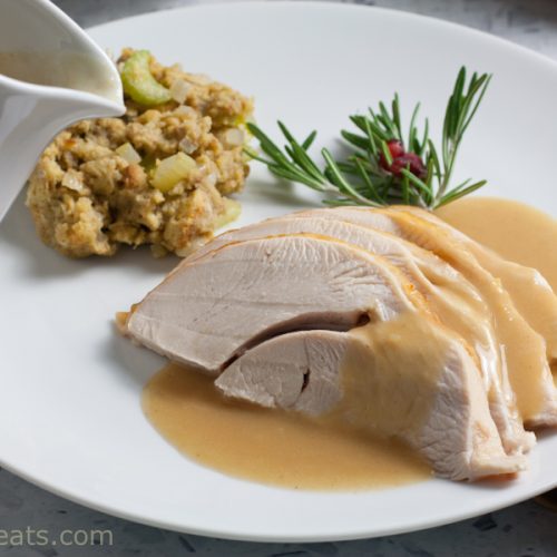 stuffing and turkey on a plate.