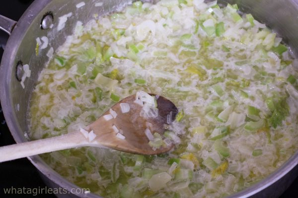Onions and celery sauteeing in butter.