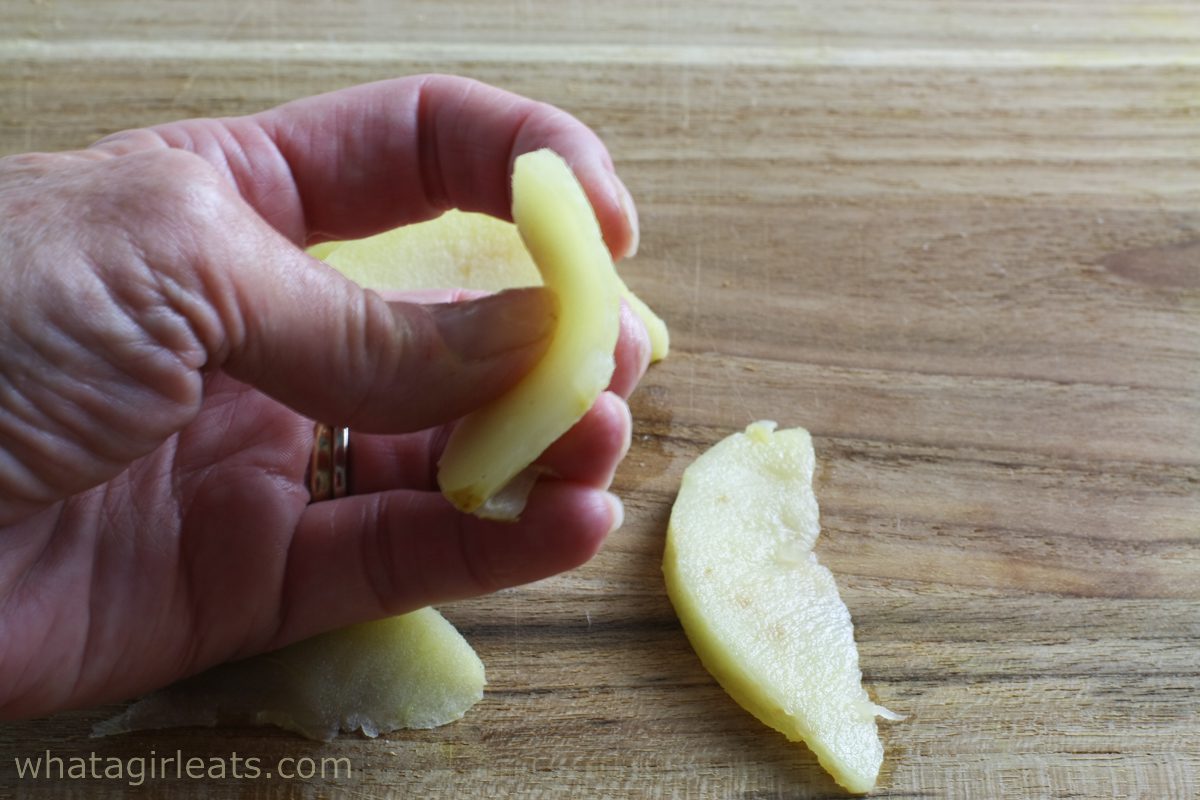 bending an apple slice.