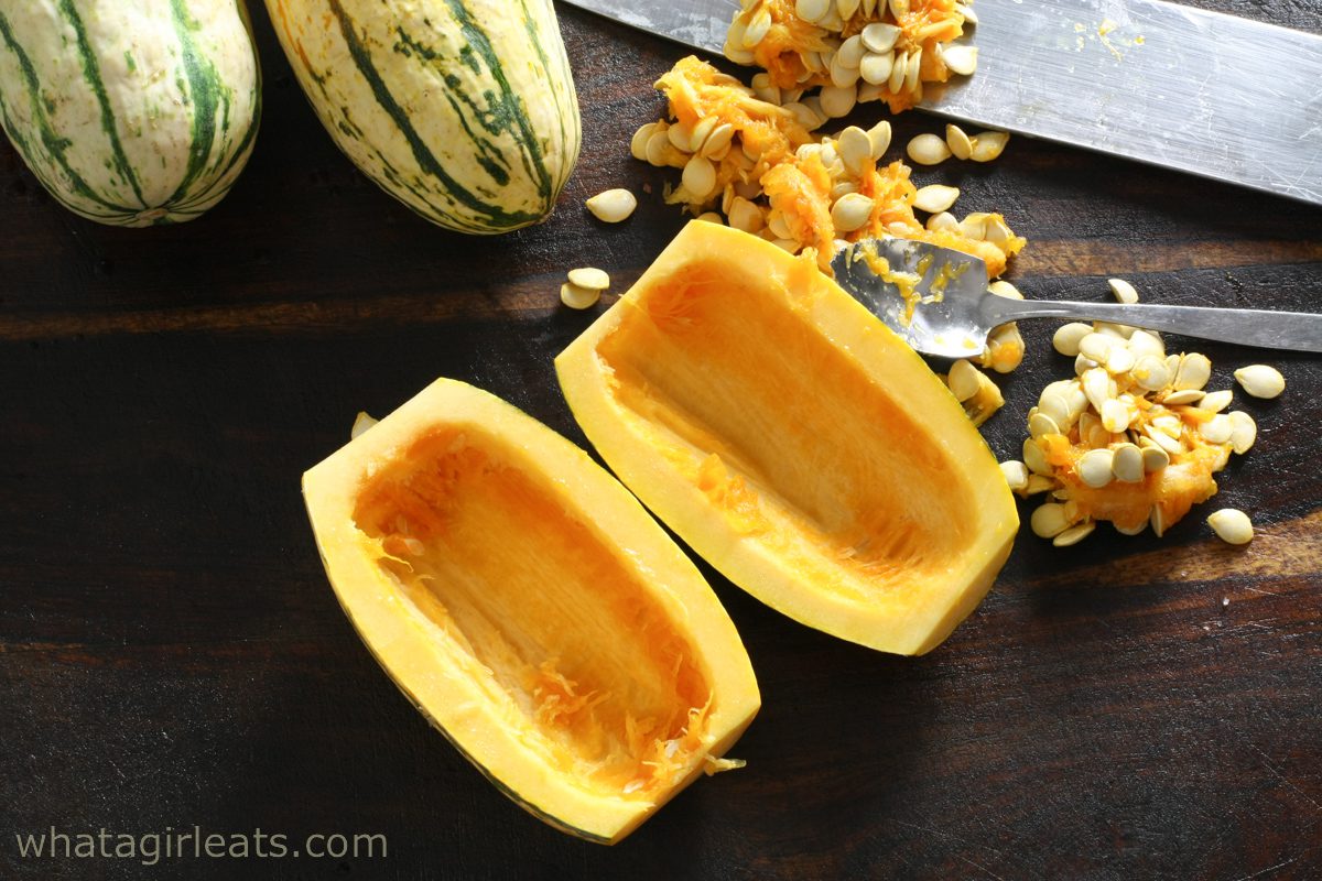 scraping the seeds out of delicata squash.