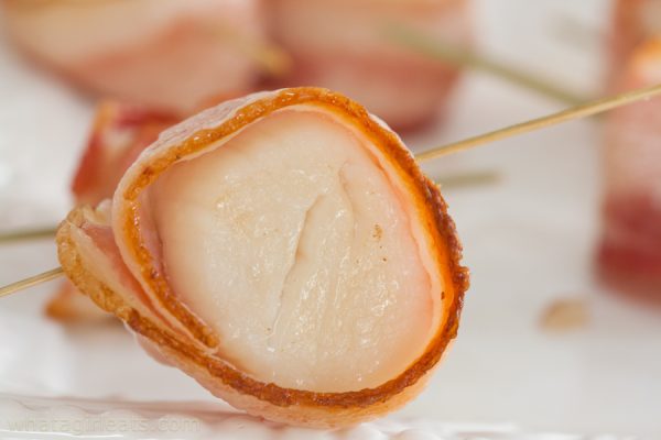 Cooked scallop with bacon.