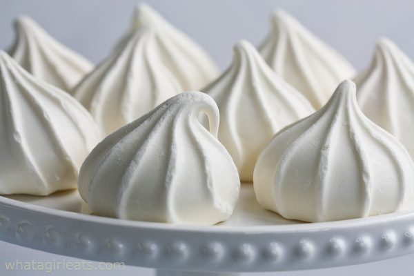 Meringues on a white plate.