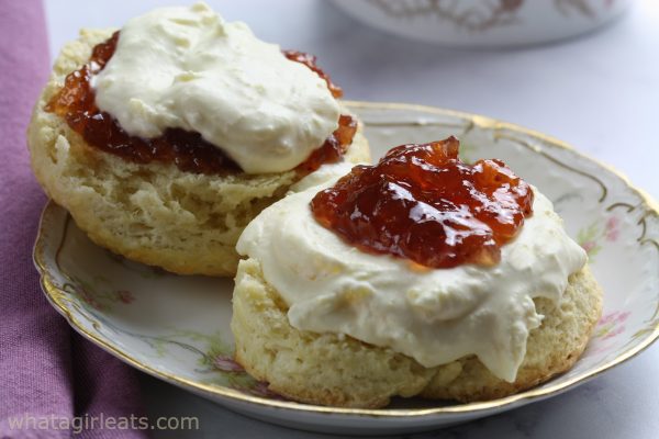 two scones with jam.