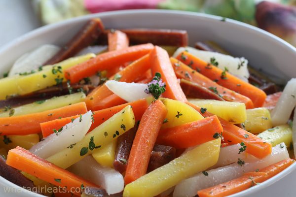 sauteed vegetables in white bowl.