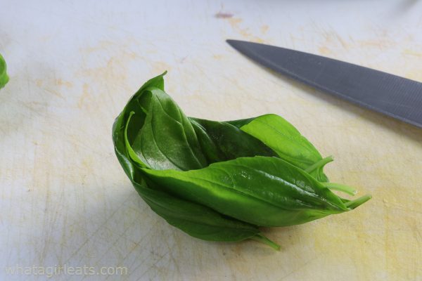 stack basil leaves.