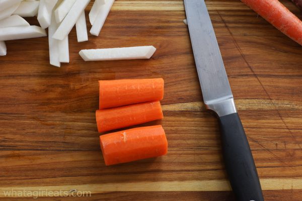 cutting carrots.