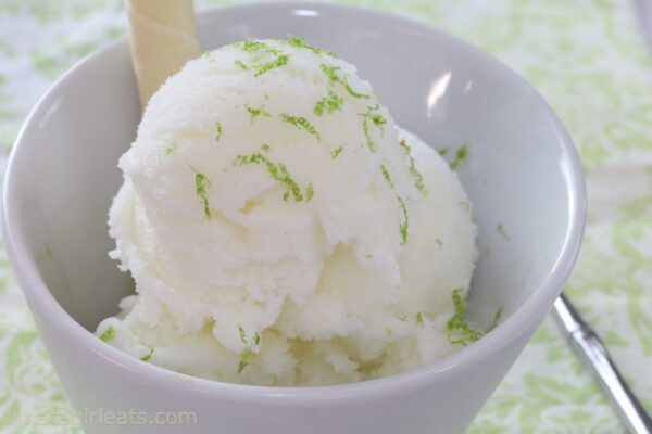 Lime sherbet in white dish.