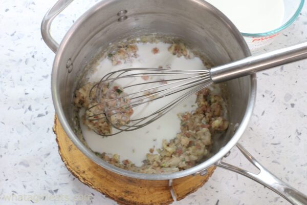 adding flour to sauce.