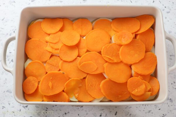 layering the vegetables in casserole dish.