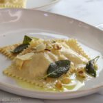 Pumpkin ravioli with browned butter and sage.